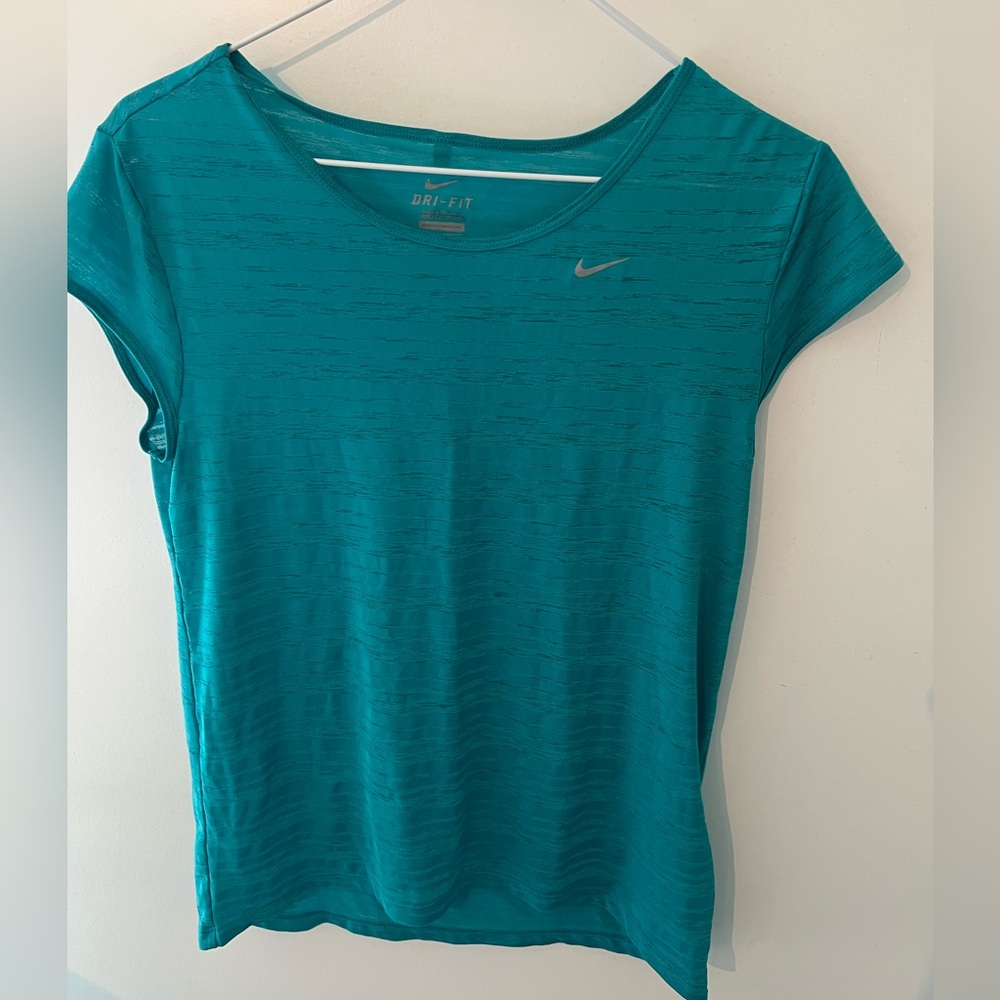 Blue Nike women’s  sports shirt